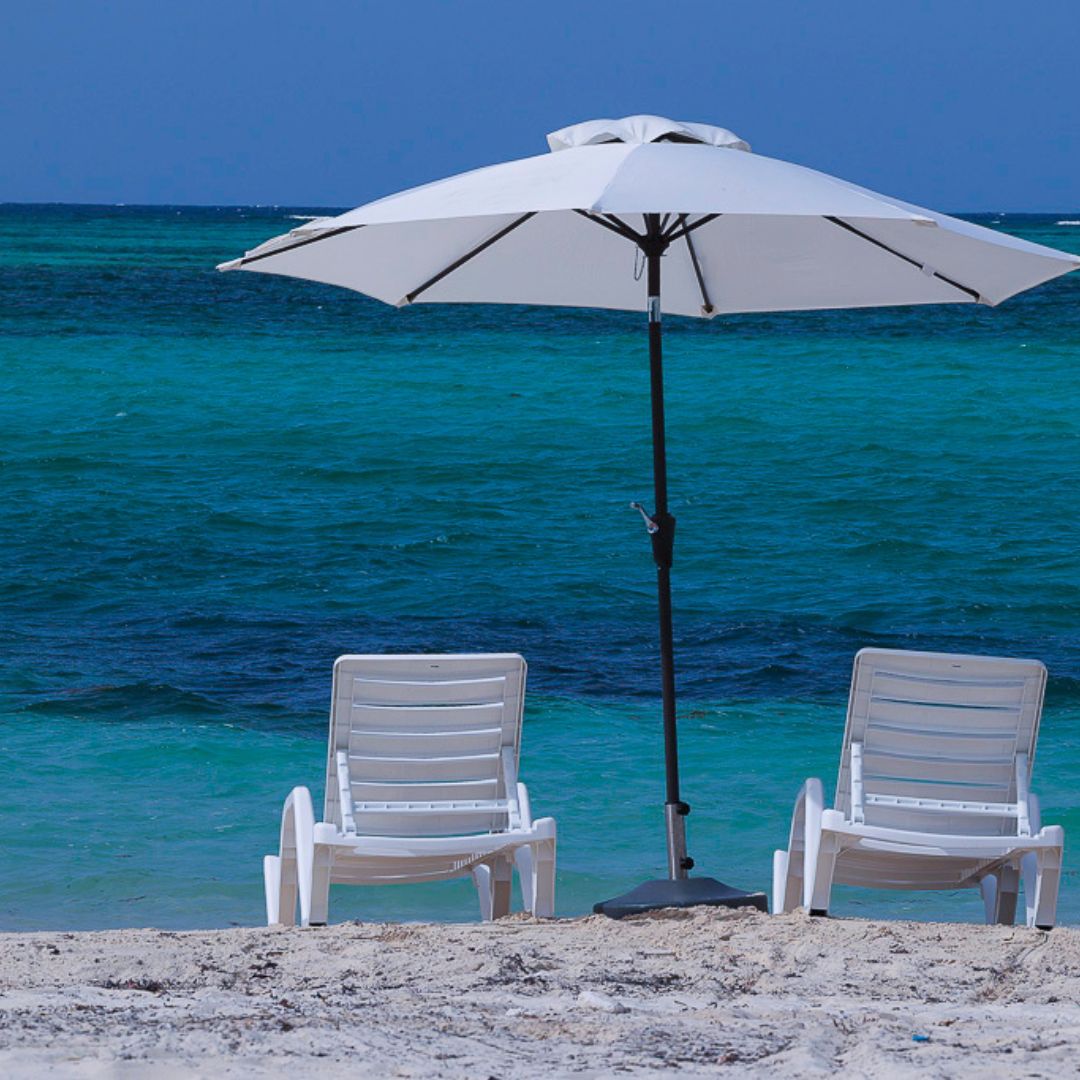 Two chairs on a beach