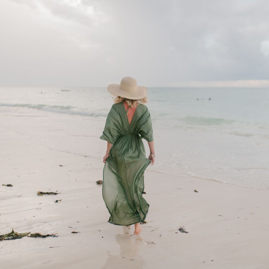 A woman walking on the beach