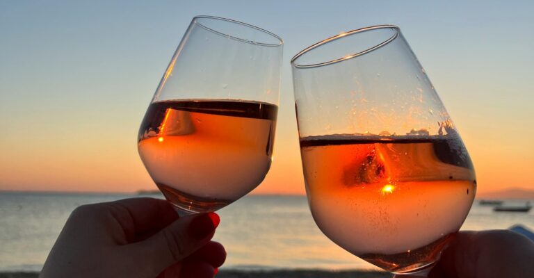 Two glasses of wine beachside at a resort