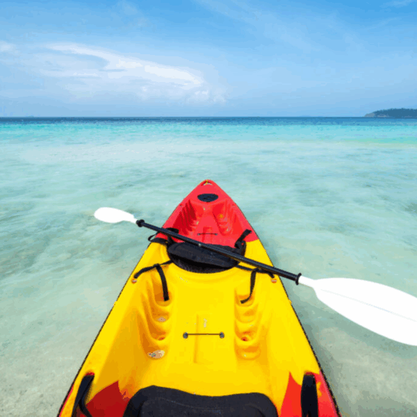 Colorful kayak on the tropical beach with blue sky at cock burn island, Myanmar