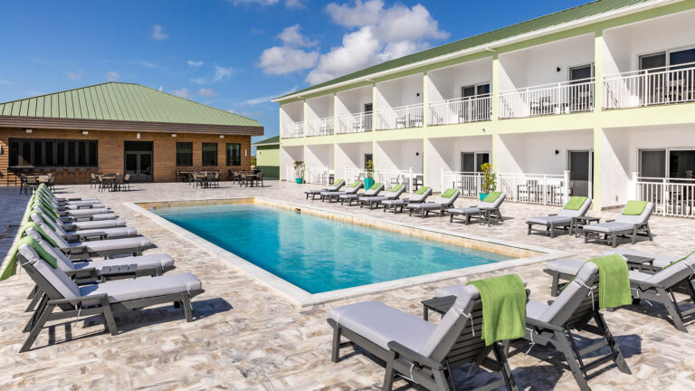 A welcoming resort nestled in the lush tropical greenery of North Caicos.